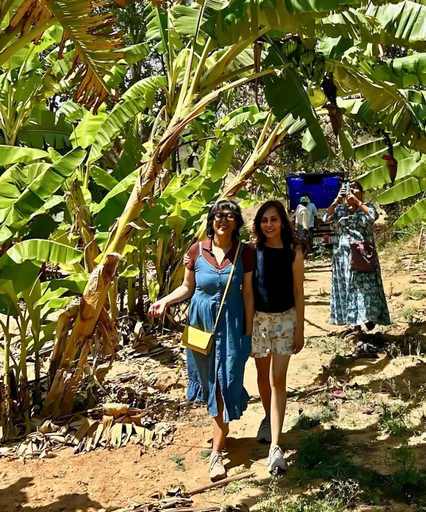 Chaitali Raizada (left), founder of Earthness taking a walk through the banana orchard at Dee Mandala farm